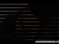 Asiatisches Girl wird gefesselt und gefoltert